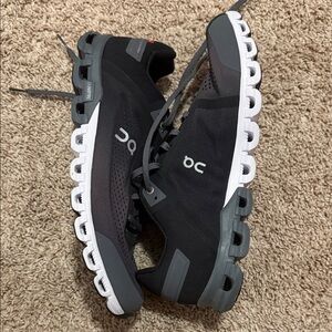 On Running Black and Gray Athletic Shoes